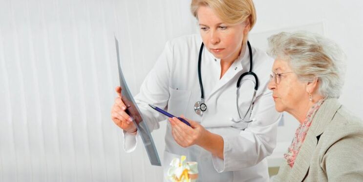 Doctor prescribes treatment for lower back pain